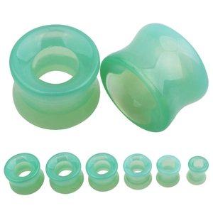 Détail d'écarteurs en verre vert creux montrant plusieurs tailles de 8mm à 16mm
