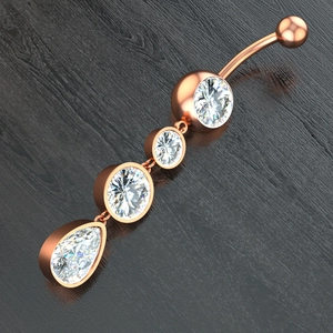 Macro view of rose gold leaf belly ring with marquise zirconia and drop pendant