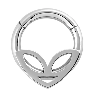 Macro detail of silver septum ring featuring a minimalist alien head pattern cutout