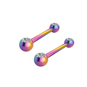 Detailed macro of rainbow surgical steel barbells with sparkling cubic zirconia inlays
