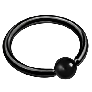 Macro shot of polished black captive bead ring for nose, ear, or lip piercings