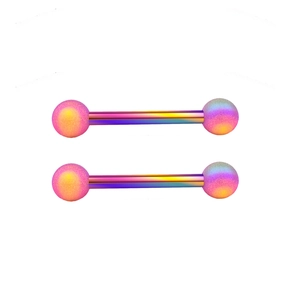 Macro shot of colorful iridescent body piercing barbells with matte glitter texture balls