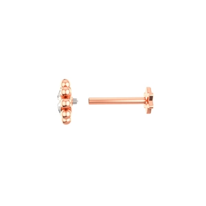 Detailed view of rose gold labret stud showing internal screw thread and crystal flower design