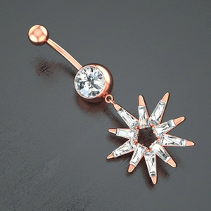 Detail of rose gold navel ring with starburst pendant and marquise zircon stones