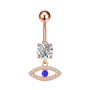 Close-up of rose gold evil eye belly ring with sparkling zircon and blue center stone