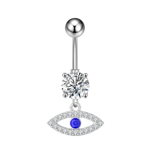 Detail of evil eye navel ring with silver metal, blue gemstone and sparkling cubic zirconia