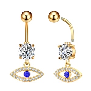 Detail of golden belly ring with moon eye design, showing screw thread and blue zircon stone