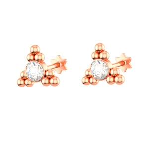 Macro shot of rose gold triangle stud earrings with Czech crystals and star-shaped backings