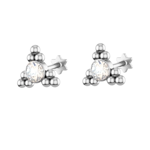 Macro detail of silver labret stud with Czech zircon and star-shaped flat back base