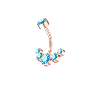 Close-up of rose gold belly ring with six gradient light blue cubic zirconia stones