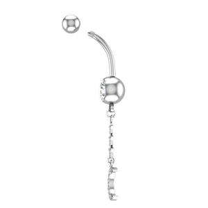 Macro detail of belly ring threading and crescent moon pendant with cubic zirconia
