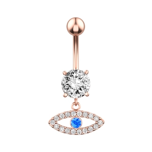 Macro detail of rose gold navel ring featuring a blue evil eye pendant and zircon stones