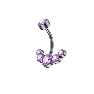 Detail of gunmetal curved navel piercing with five faceted purple gemstones