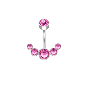 Detail view of the polished stainless steel belly ring with sparkling pink crystals