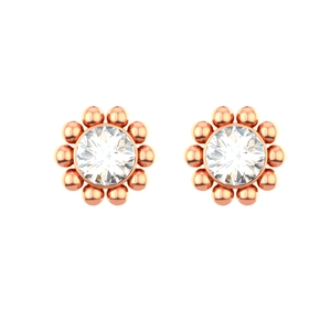 Detailed macro view of daisy-shaped rose gold stud earrings with clear crystal centers