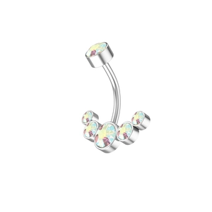 Macro detail of silver curved navel ring with iridescent AB crystals in fan shape