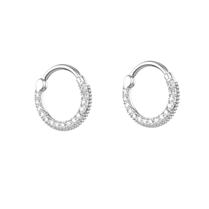 Close-up of silver steel clicker rings with double-row zircon pavé and hinged closure