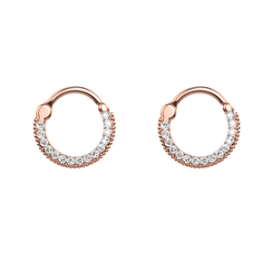 Close-up of rose gold piercing hoops featuring micro-pave cubic zirconia on white background