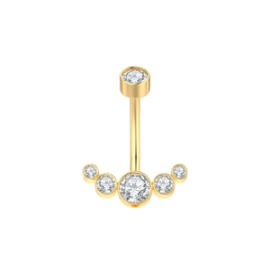 Close-up of golden belly piercing ring with curved bar and 6 sparkling clear gemstones