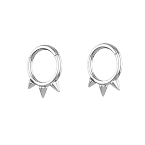 Polished stainless steel clicker nose ring featuring three sharp punk style cone studs