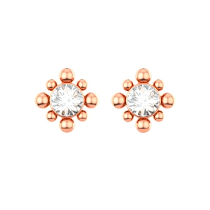 Macro shot of rose gold stud earrings featuring clear Czech crystals in a flower design