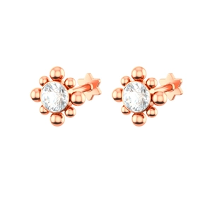 Detailed view of rose gold stud earrings with round zircon and star-shaped flat back