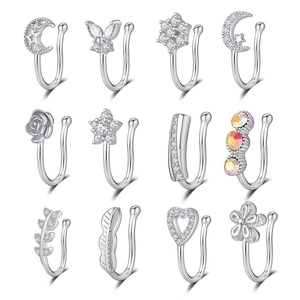 Set de 12 faux piercings de nez argentés avec zircons, motifs étoile et papillon