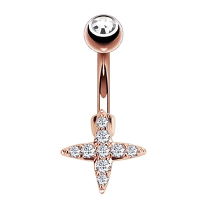 Makroaufnahme von Bauchnabelpiercing in Roségold mit Zirkon-besetztem vierzackigem Stern