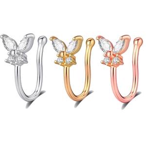 Détail de bijoux de nez papillon sans perçage en argent, or et or rose avec zircons