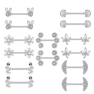 Detailed set of silver stainless steel nipple rings with zircon animal and floral designs