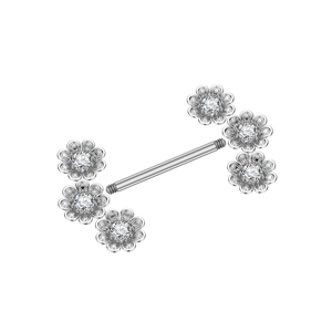 Macro view of silver nipple rings with zircon daisy ends and spiral hollow metal petals