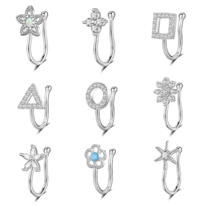 9-piece set of silver non-pierced nose clips with geometric and flower opal designs