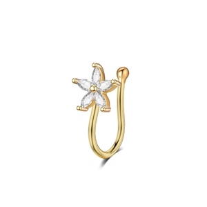 Detail of a gold flower non-pierced nose ring featuring sparkling marquise cut crystals