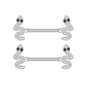 Macro detail of snake-shaped nipple rings with white zircons and polished silver finish