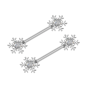 Detailed view of silver snowflake nipple rings with star-shaped cubic zirconia stones