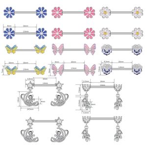 Detail view of nipple rings with floral and bear pendants showing precise measurements
