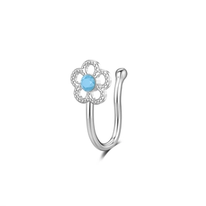 Silver non-pierced nose clip with a light blue flower design on white background