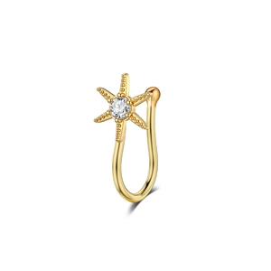 Detail of a gold-plated hexagram fake nose ring featuring a central sparkling zircon stone