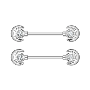 Macro detail of silver nipple barbells with crescent moon zircon and polished finish