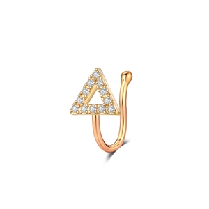 Macro detail of rose gold U-shaped non-piercing nose ring with zircon triangle design