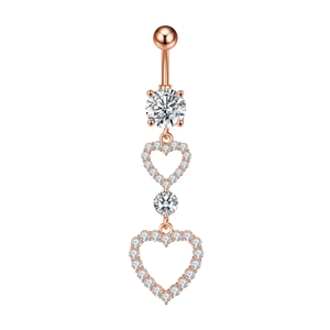 Close-up of rose gold triple-layer navel ring with zircon-encrusted heart pendants