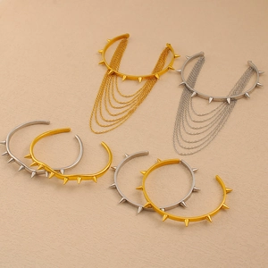 Bracciale multistrato in acciaio inossidabile con borchie e nappe color oro e argento