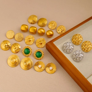 Vintage geometric relief earrings in gold and silver steel with green gemstone and pearl