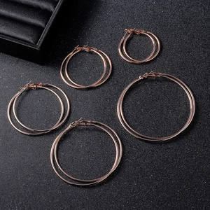 Five-pair set of elegant rose gold hoop earrings in various sizes for stylish women