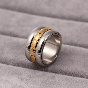 Bague rotative moderne en acier titane 12mm avec engrenages argentés et dorés
