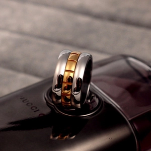 Bague rotative bicolore en acier titane de 12 mm de large, fini poli argent et doré
