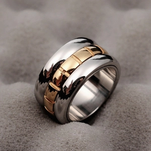 Bague rotative en acier titane de 12mm de large avec design bicolore argent et doré
