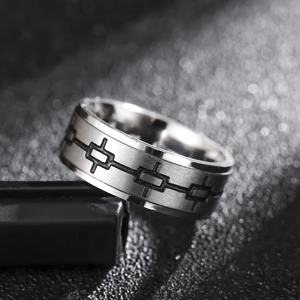 Retro geometric pattern stainless steel ring with brushed finish and industrial design