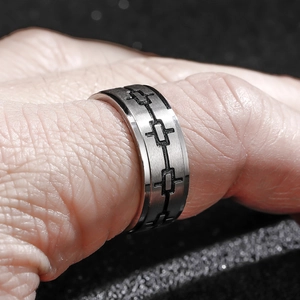 Minimalist vintage stainless steel ring with brushed finish and geometric pattern engraving