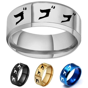 Macro shot of JoJo anime stainless steel rings with Gogo Japanese sound effect logo